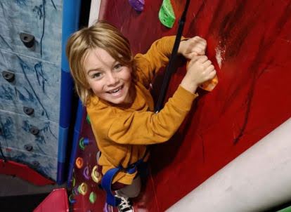 Kid climbing at Vertigo Climbing - Visit Ruapehu.jpg